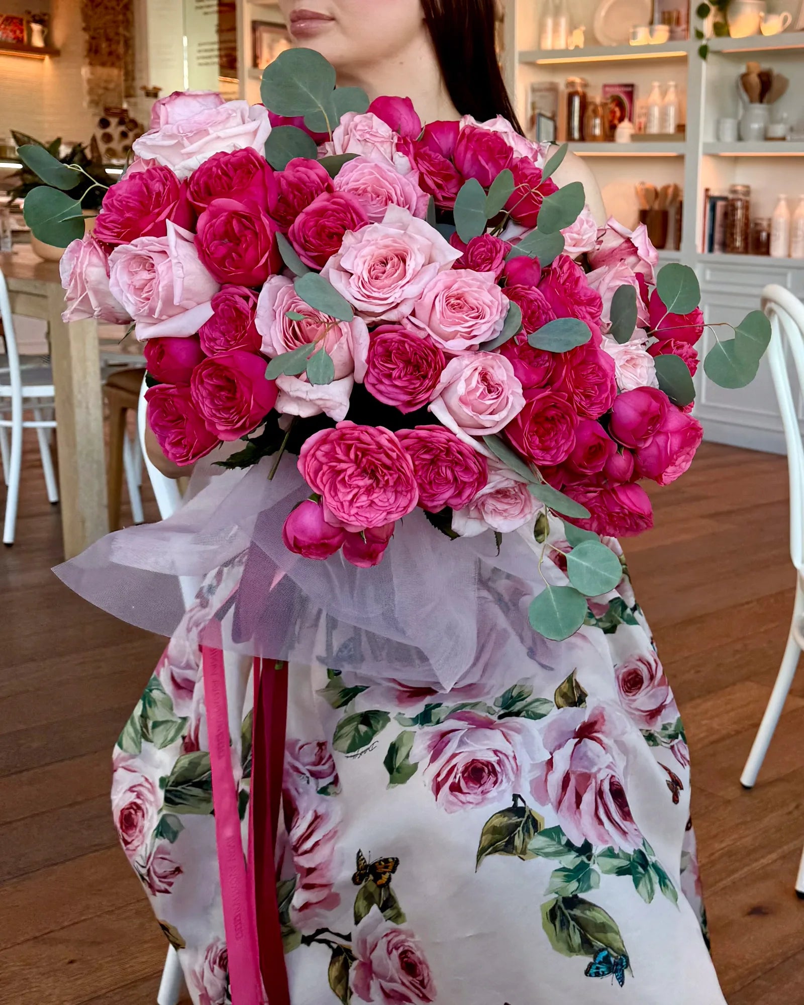 Large hand-tied bouquet of O’Hara and Piano pink garden roses with eucalyptus, vibrant romantic floral arrangement
