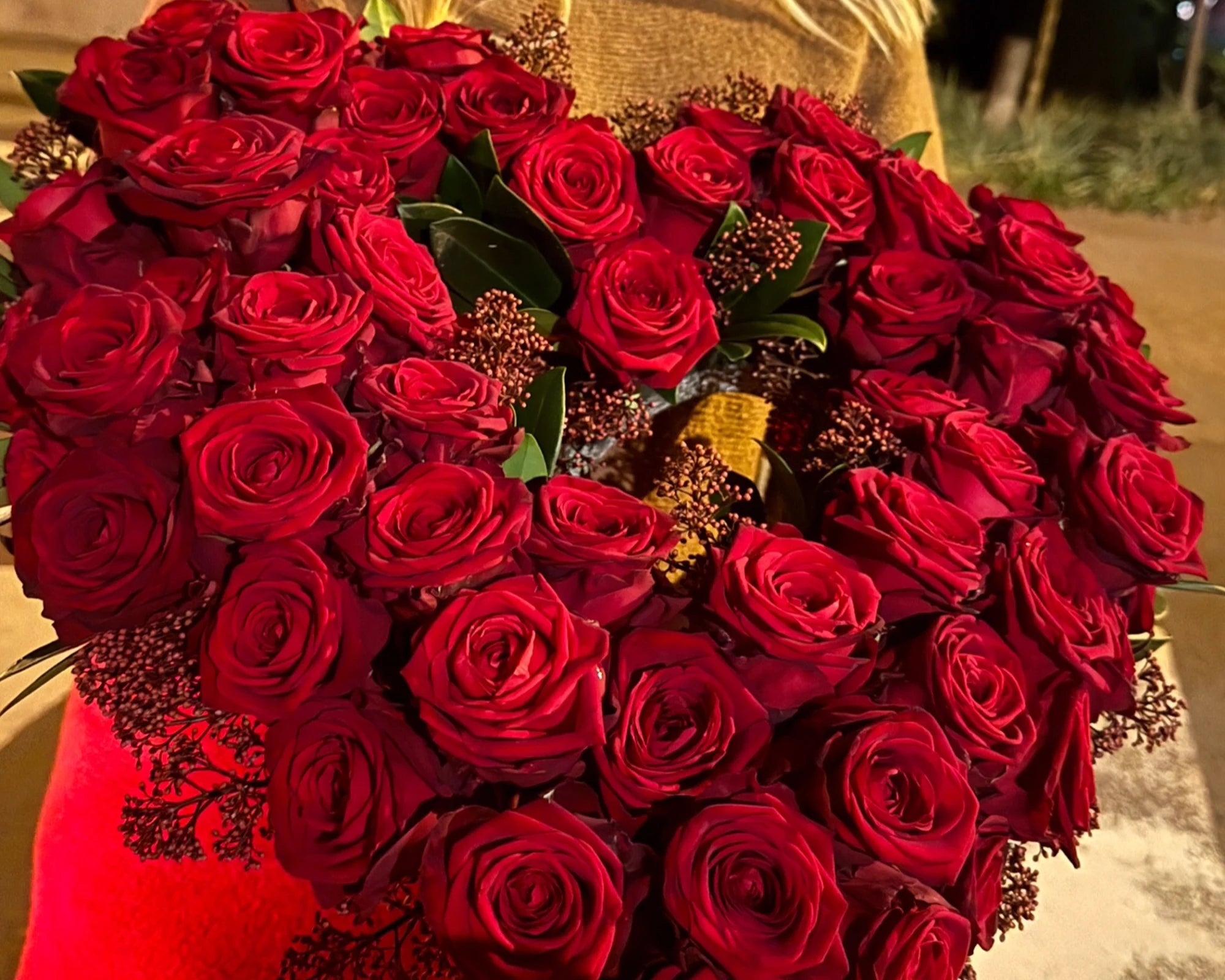 Heart-shaped arrangement of 51 red roses, luxury romantic centerpiece handcrafted by a Los Angeles florist