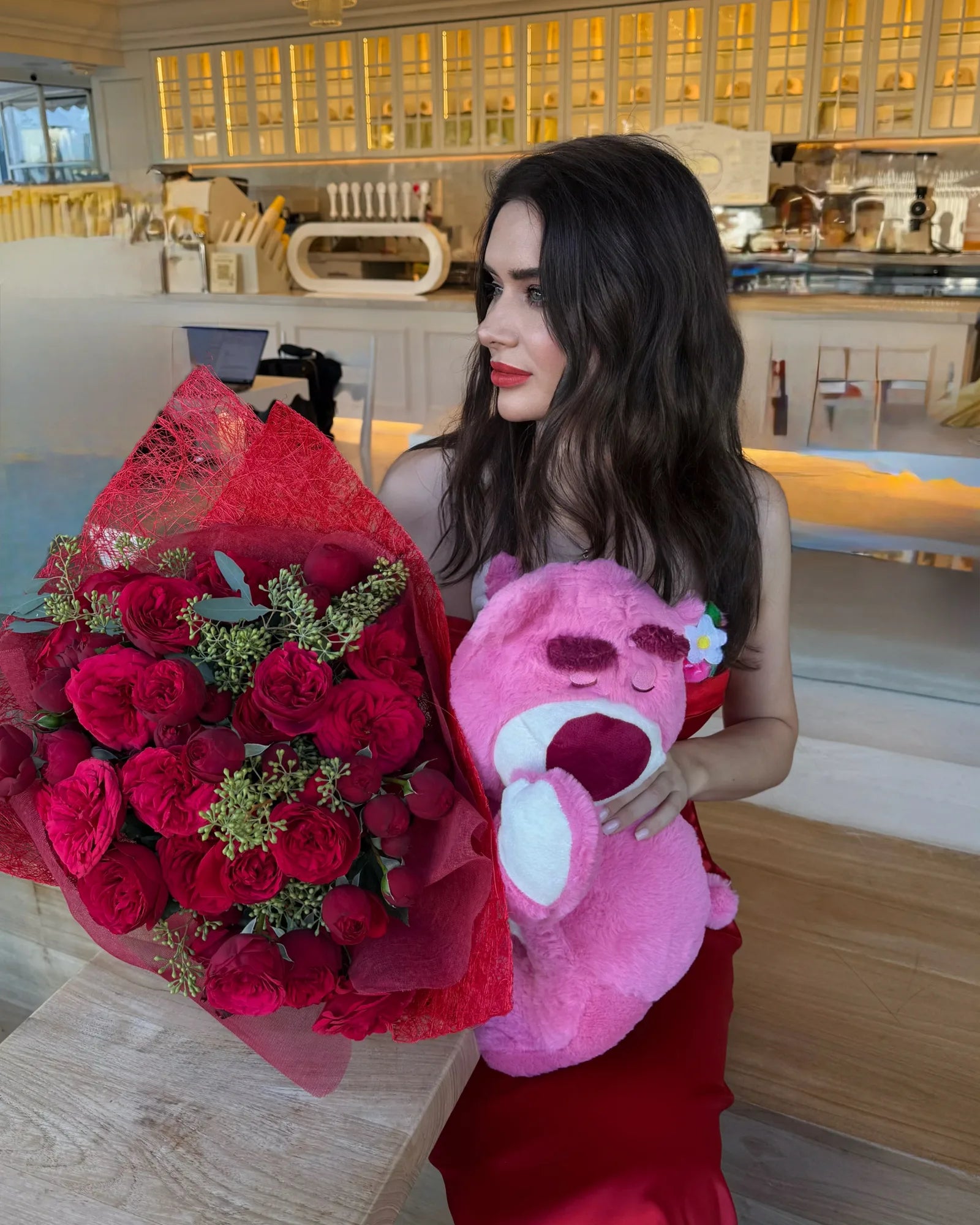 Romantic bouquet of 30 red Red Piano garden roses with a plush teddy bear by Kvitkova Vanil