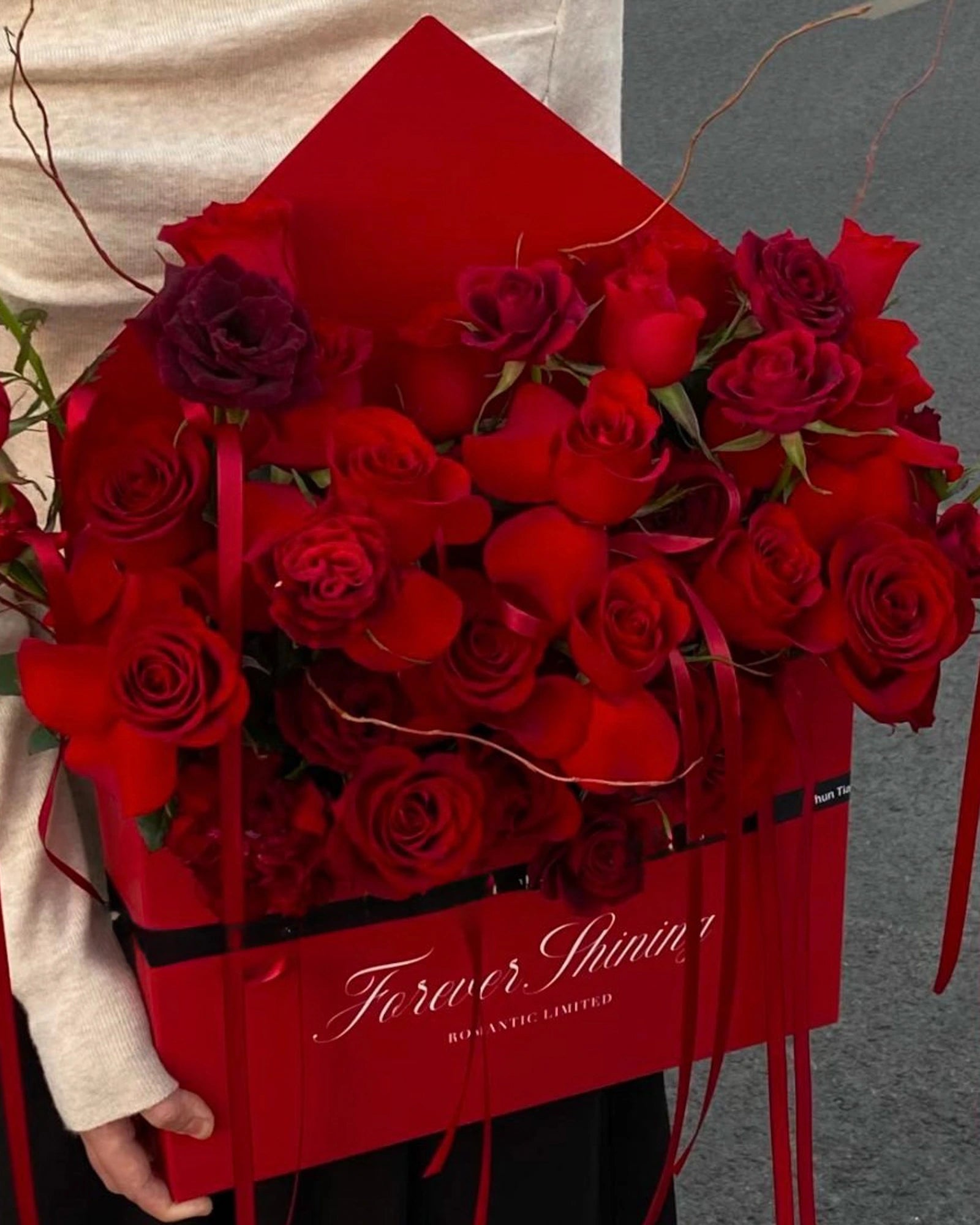 Love Letter Roses arrangement with premium red roses in a romantic boxed design, handcrafted by a Los Angeles florist